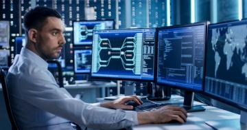 IT professional reviewing cybersecurity threats
