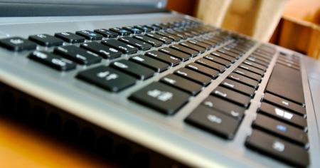 A Chromebook laptop sitting on a desk