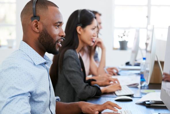 IT support helping via desktop with remote access software