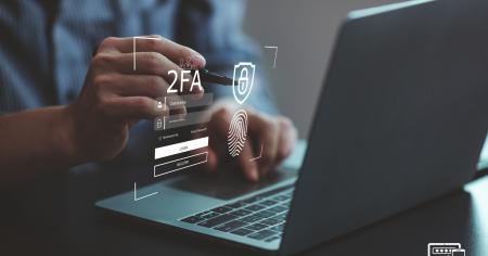 An employee using multi-factor-authentication (MFA) to access his computer.