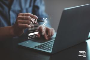 An employee using multi-factor-authentication (MFA) to access his computer.