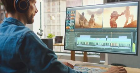 A person using Splashtop to remotely access another desktop to use video editing software.