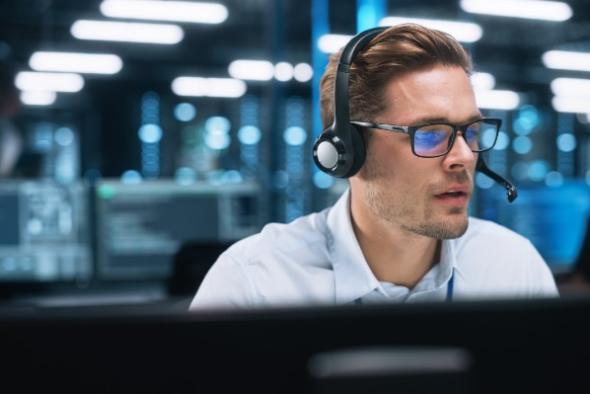 Man studying security measures for remote access software